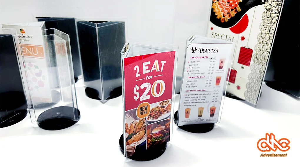 Ke Menu Mica 3 Mat Tam Giac De Xoay, Standee Mica De Ban cao cấp tại DTC Ads Ke Menu Mica 3 Mat Tam Giac De Xoay, Standee Mica De Ban cao cấp tại DTC Ads